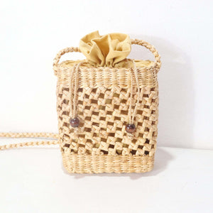 تالاني – حقيبة كروس بودي من القش المنسوج يدوياً