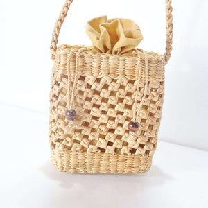 تالاني – حقيبة كروس بودي من القش المنسوج يدوياً