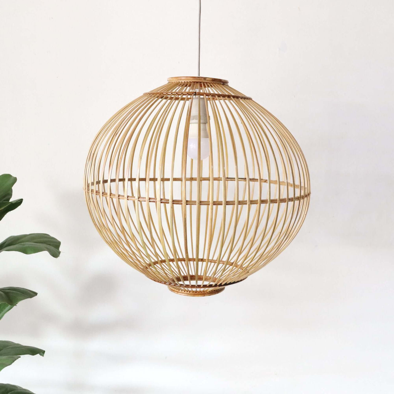 WARRADA — bamboo pendant light above a dining table for warm ambient glow