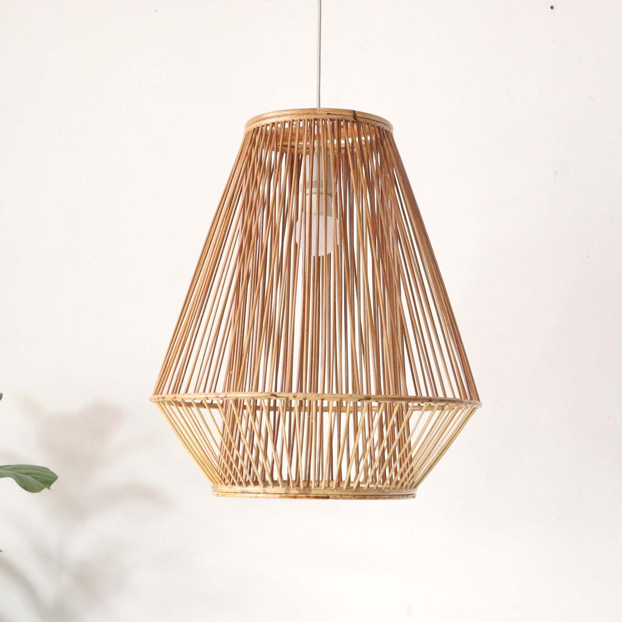 LALARIN — handwoven bamboo pendant light shade with an open weave that diffuses soft golden light