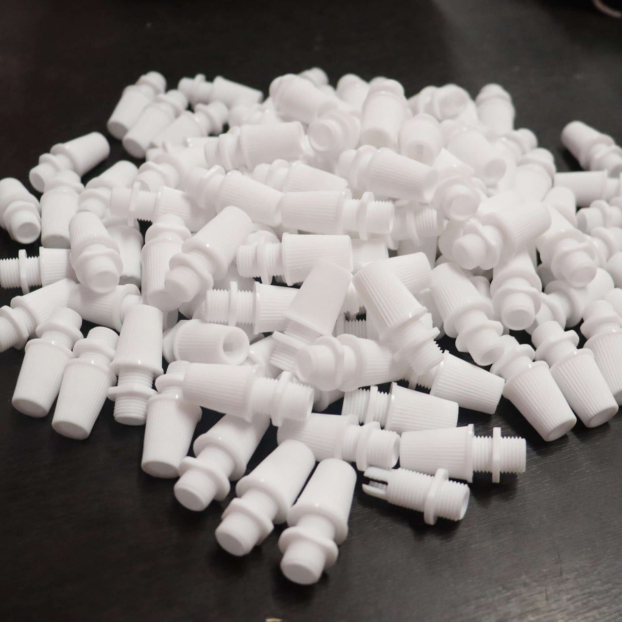 White Cord Grips Lampshade Holder – Plastic Screw Style Cord Grip (20 pcs.) collection on a surface.