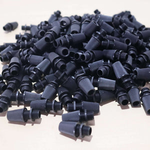 Black Cord Grips Lampshade Holder – Plastic Screw Style Cord Grip (20 pcs.) in a pile for lighting projects.