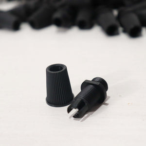 Black Cord Grips Lampshade Holder – Plastic Screw Style Cord Grip (20 pcs.) showing pieces on a light surface.