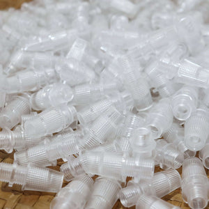 Cord Grips Lampshade Holder – Plastic Screw Style Cord Grip (20 pcs.) in a pile of clear plastic components.