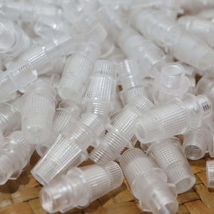 Cord Grips Lampshade Holder – Plastic Screw Style Cord Grip (20 pcs.) in a pile, made from durable clear plastic.