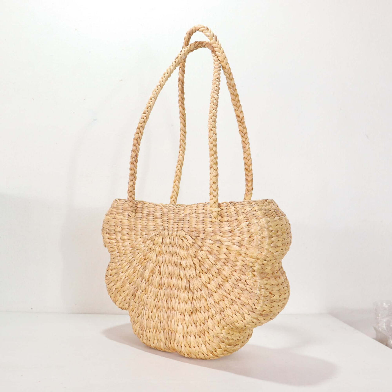 Jidara — handwoven straw handbag with a soft, natural weave