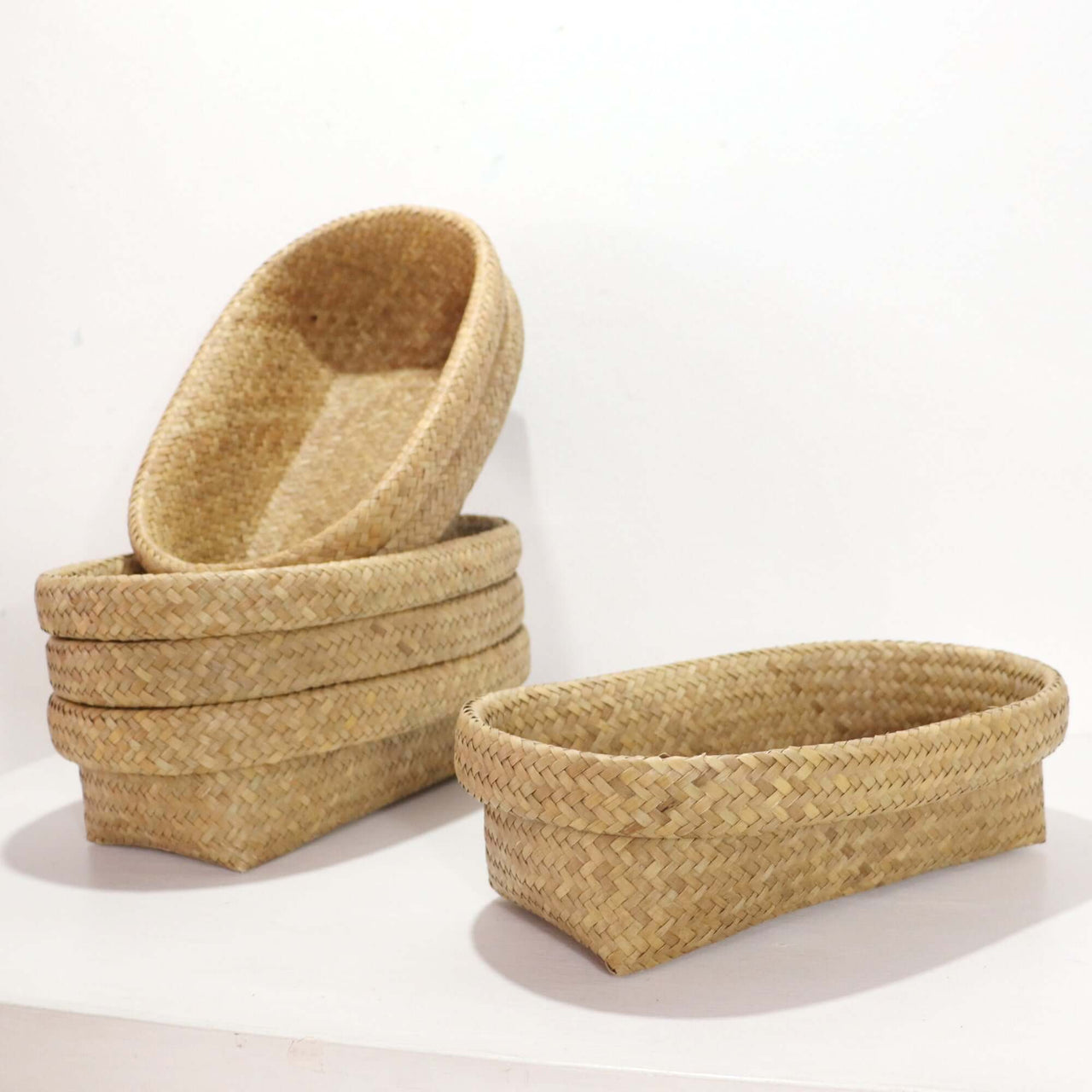 Nattalee Oval Pandanus Basket Natural, handwoven storage basket with a soft oval shape and natural texture.
