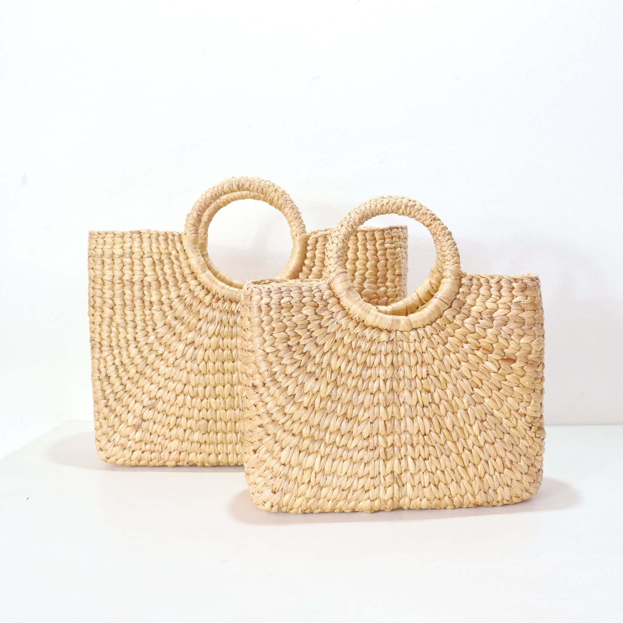 VI PA VEE — handwoven straw basket bag with a soft, natural weave