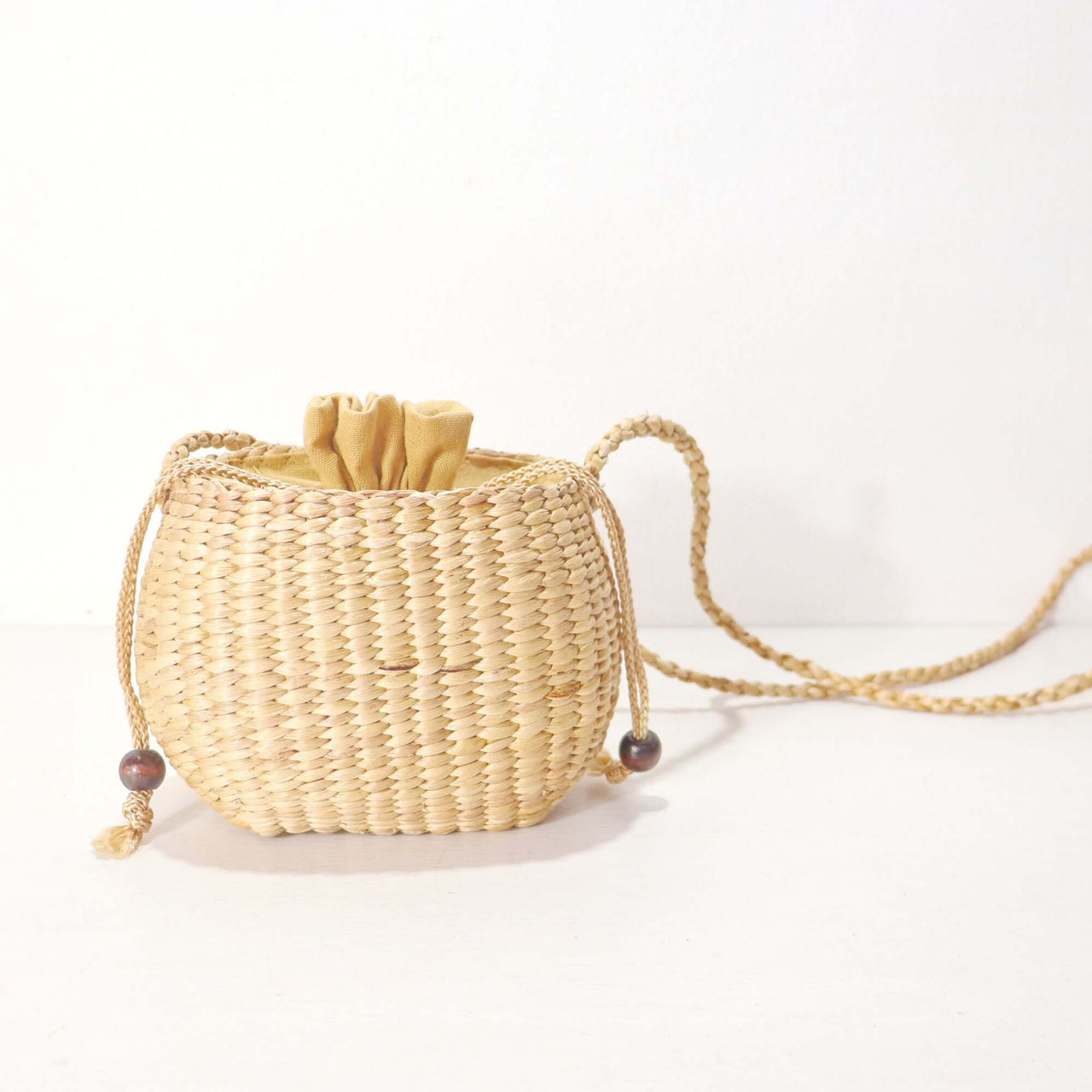 WANAREE - Cross Body Bag, a stylish lightweight bag with a woven design, perfect for everyday use.