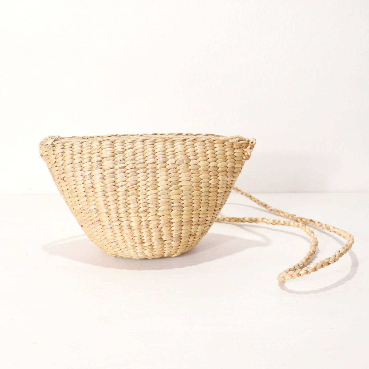 Tanaree — handwoven straw crossbody bag with a soft, natural weave