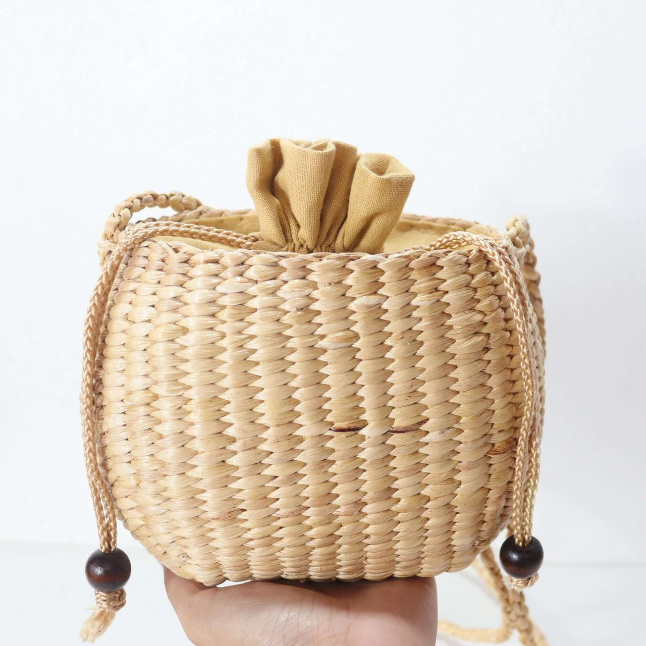 WANAREE - Cross Body Bag woven style with drawstring closure for practical everyday use