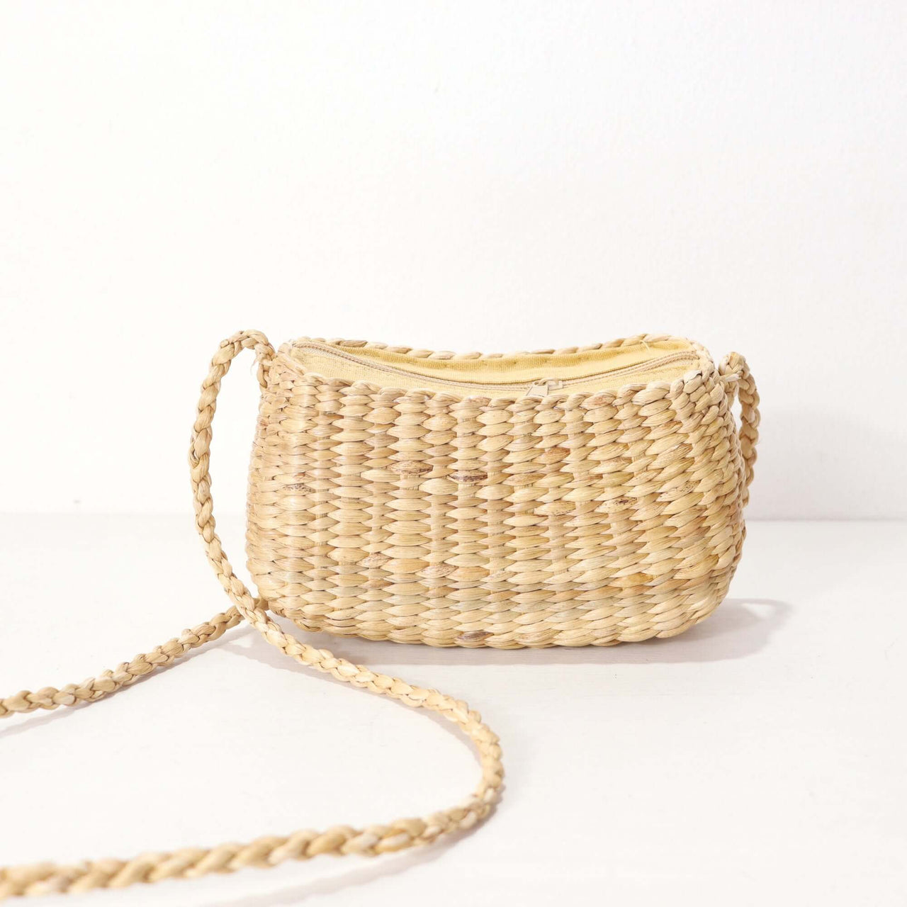 Wanalee — handwoven straw crossbody bag with a soft, natural weave