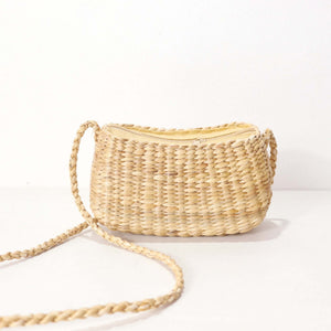 Wanalee — handwoven straw crossbody bag with a soft, natural weave