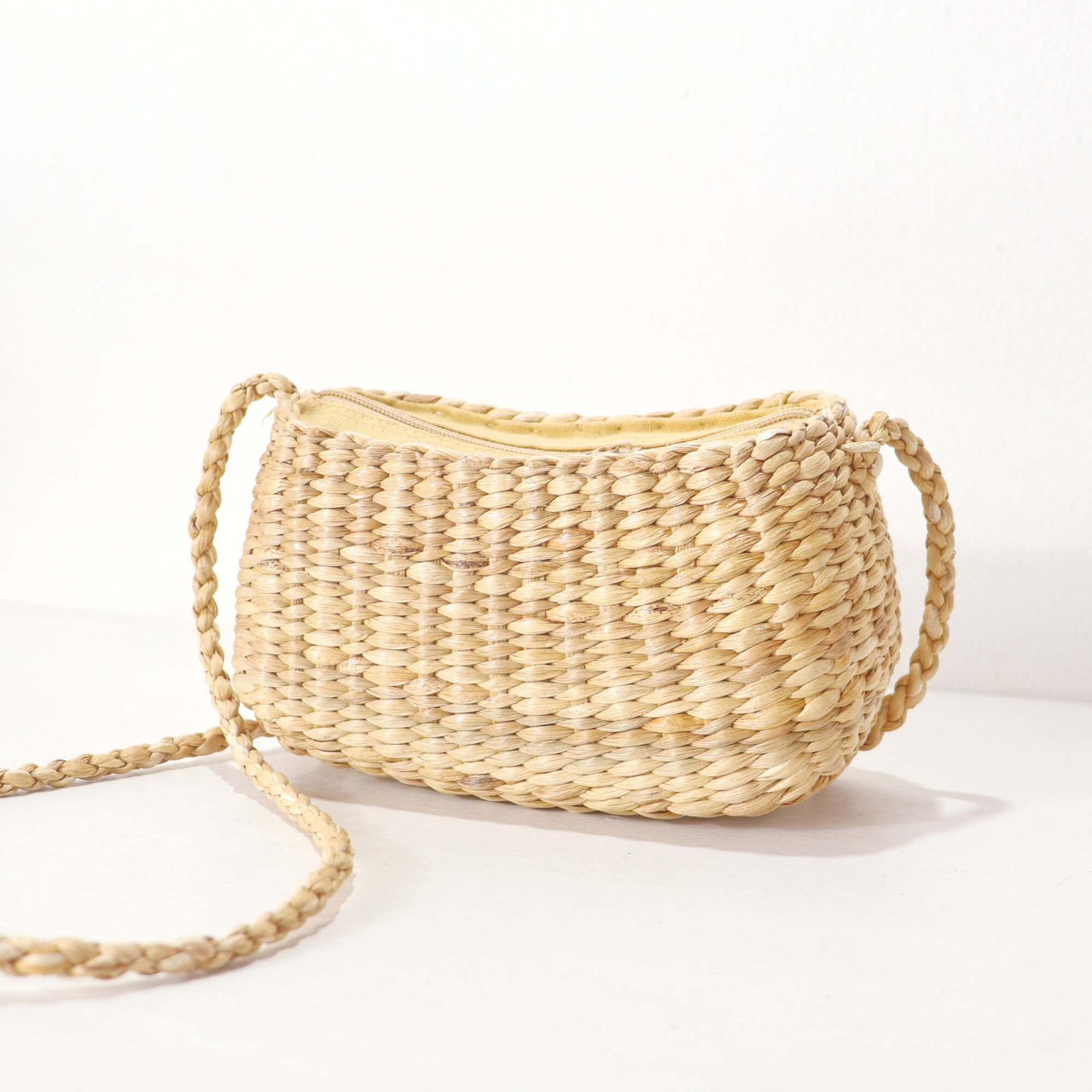 Wanalee — straw crossbody bag styled for summer beach outings