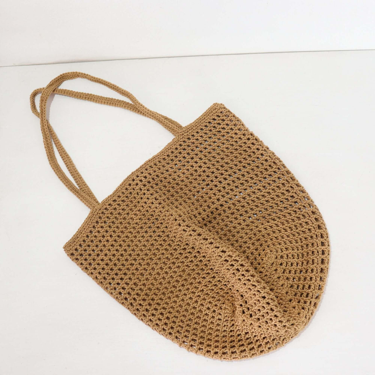 Brown - Crochet Shoulder Bag showcasing a soft texture and elegant design, perfect for effortless everyday styling.
