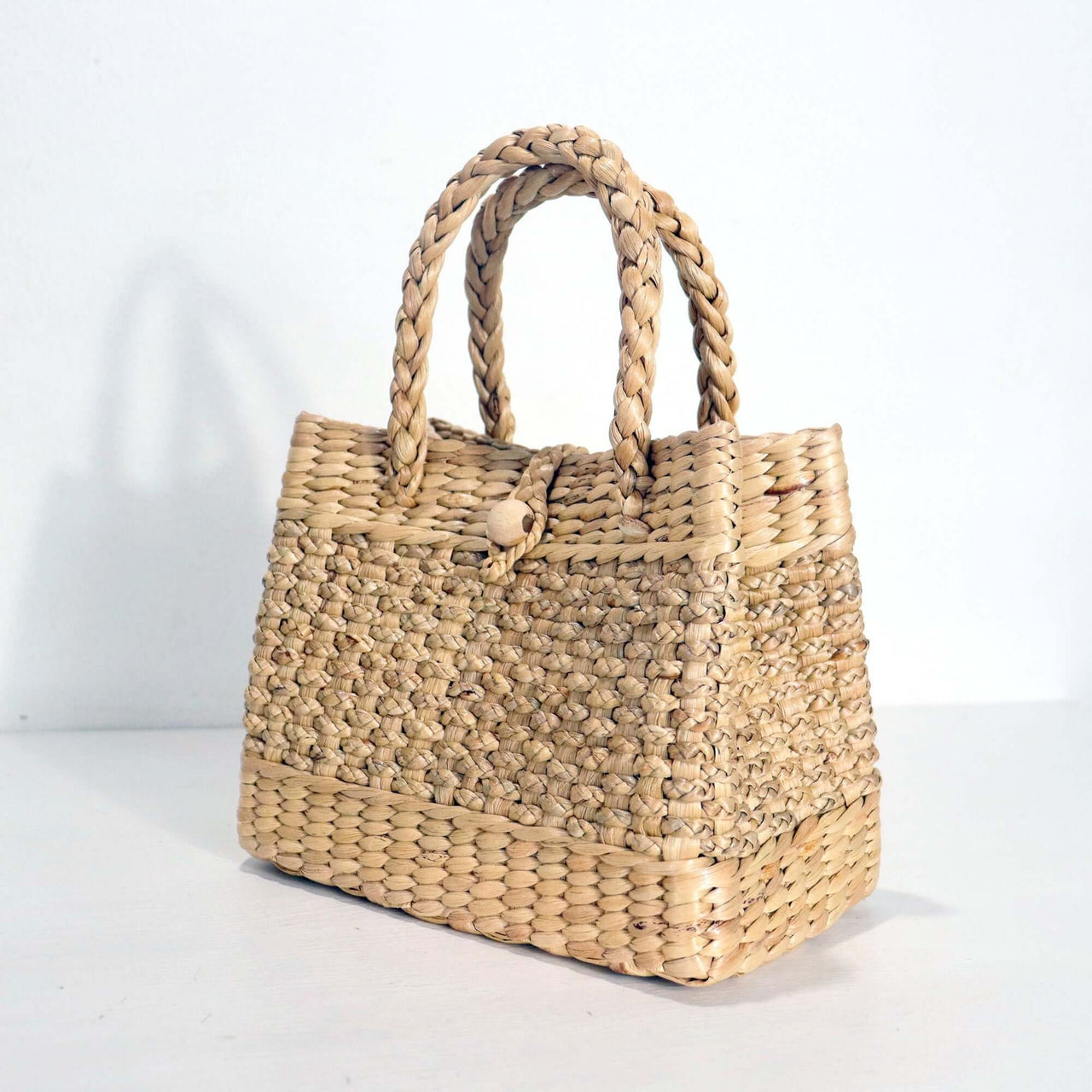 PASSA handwoven straw handbag with natural woven texture, by Thai artisans
