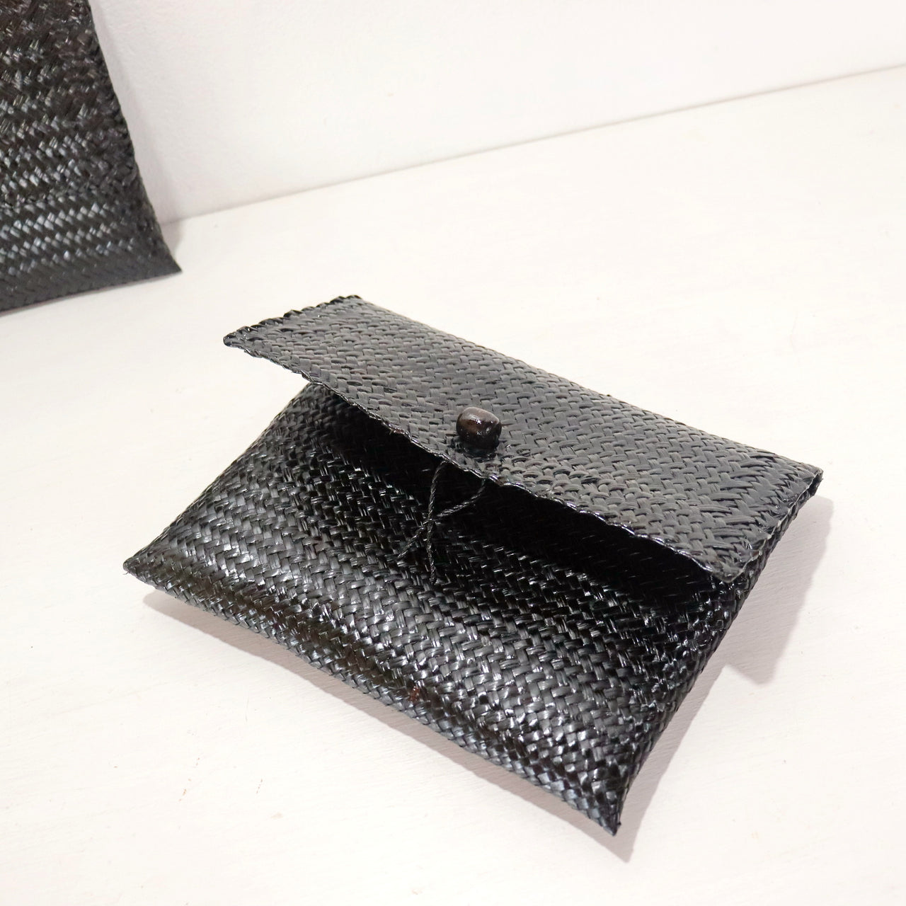 WANALA Black Krajood Clutch Bag
