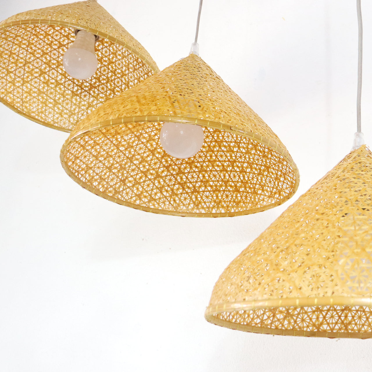 YEN — bamboo pendant light above a dining table for warm ambient glow