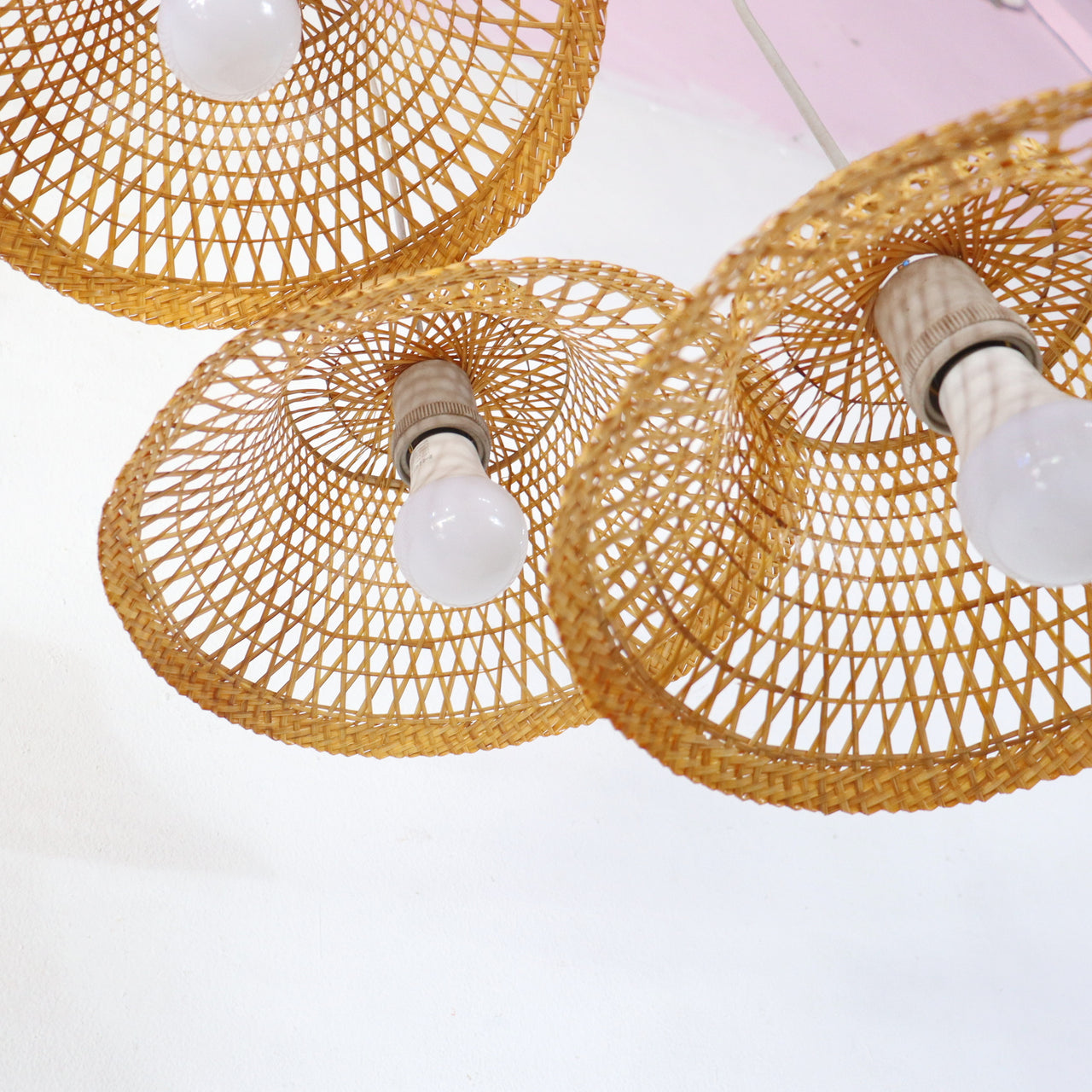 ANANDA — bamboo pendant light above a dining table for warm ambient glow