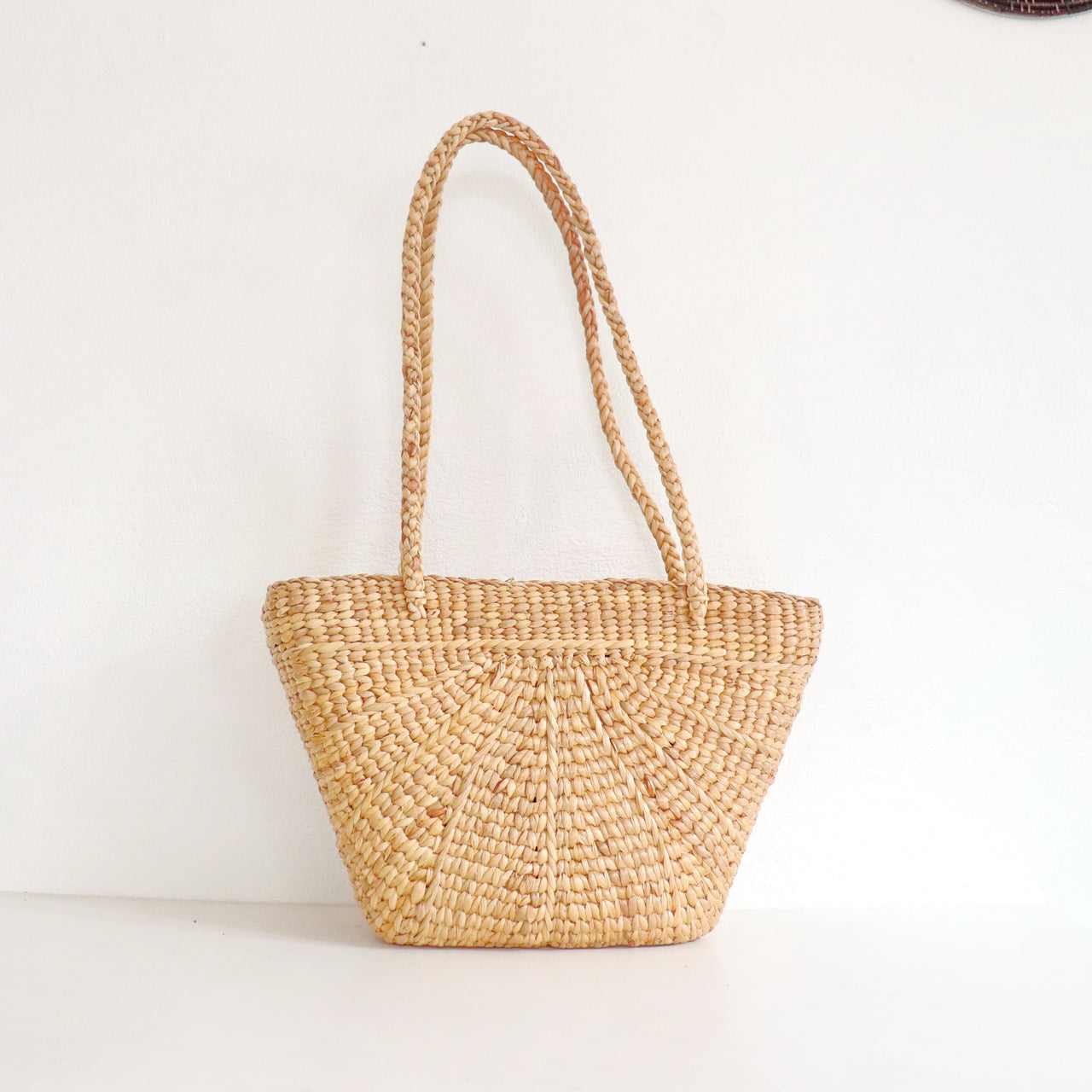 RA — handwoven straw shoulder bag with a soft, natural weave
