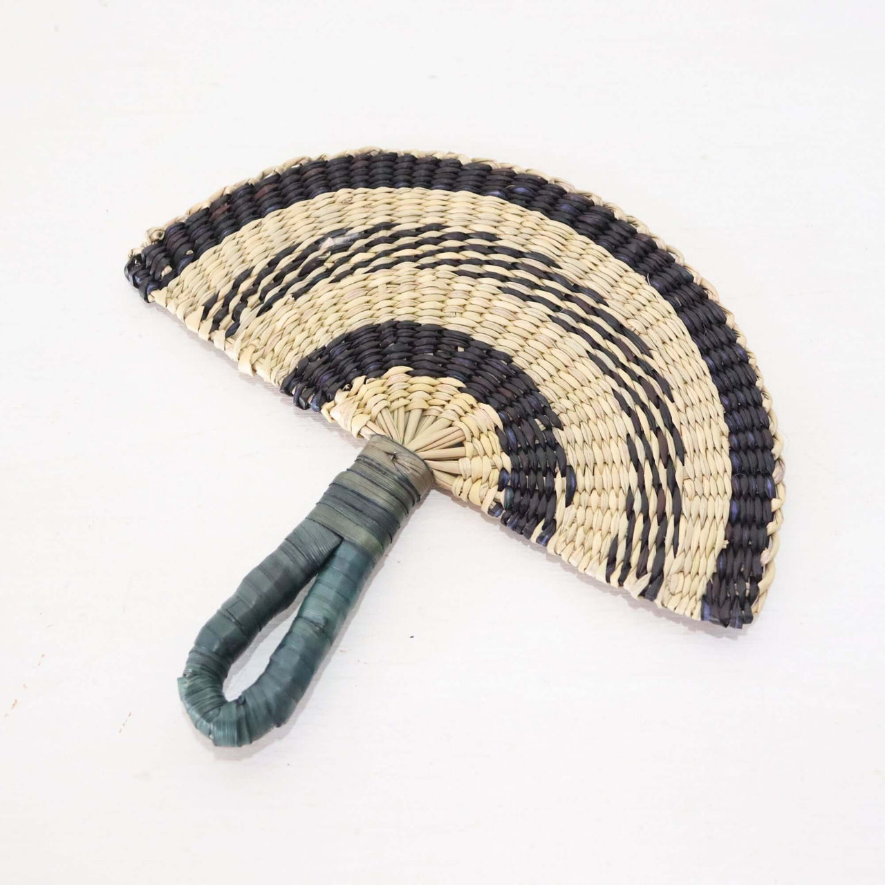 LA LIN – Handwoven Fan (Wall Hanging & Hand Fan) | Black & White, handwoven in natural fibers with a black and white pattern.