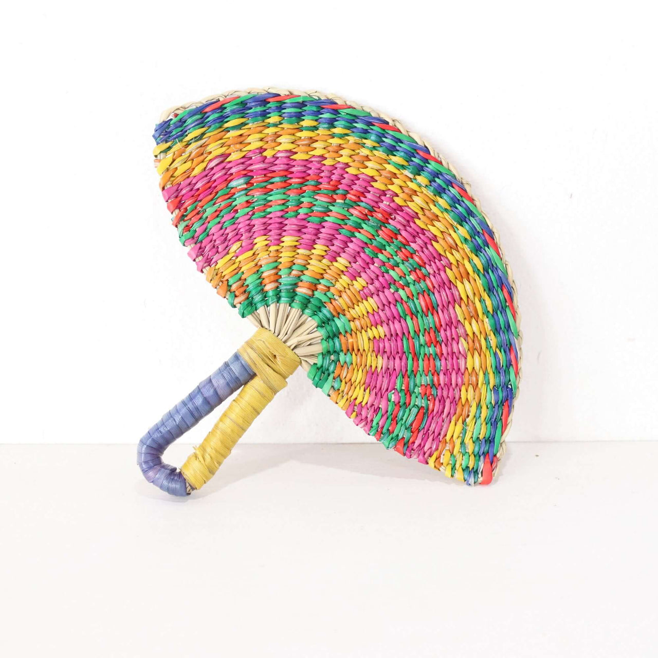 LA LA VAN – Handwoven Fan (Wall Hanging & Hand Fan) featuring vibrant multicolored patterns.
