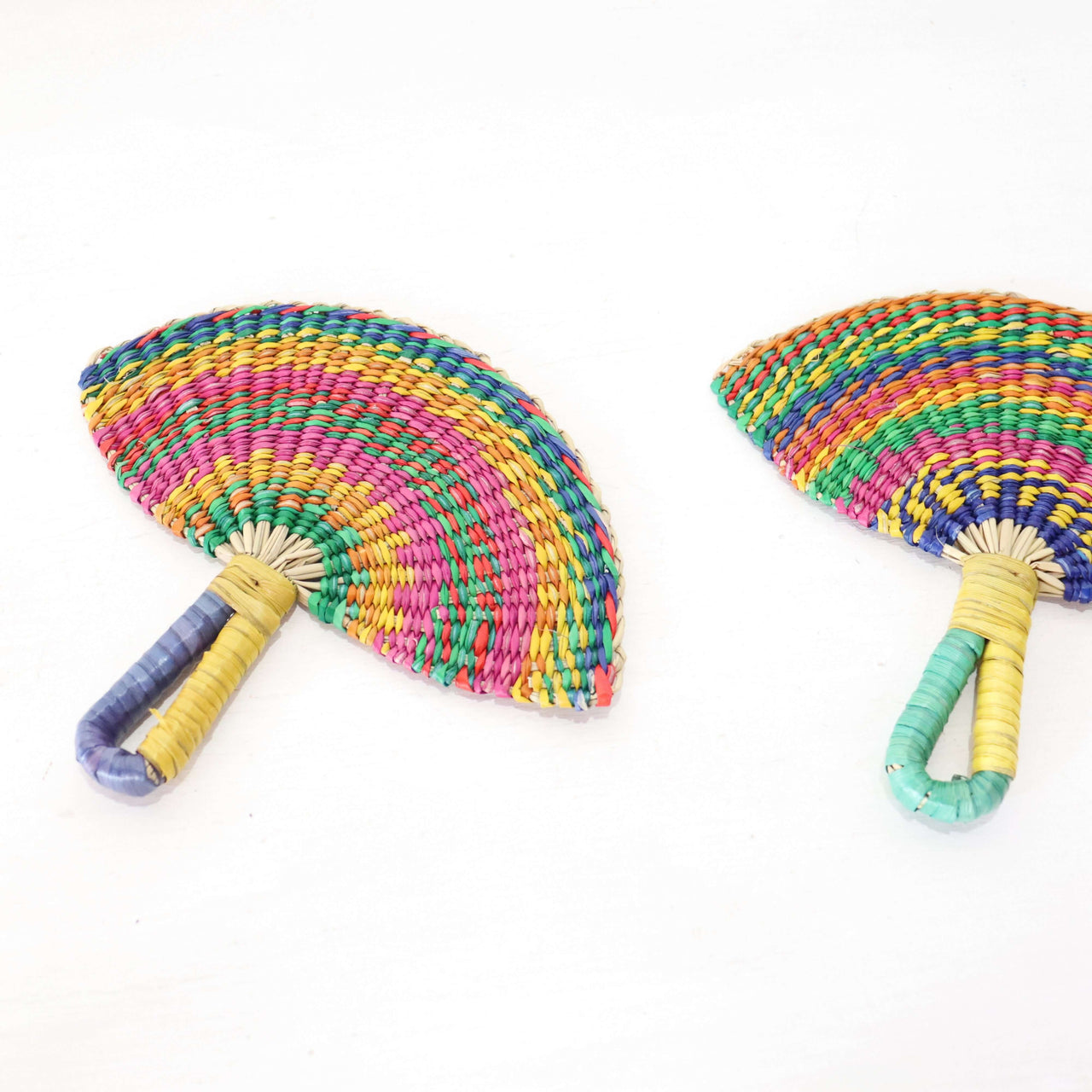 LA LA VAN – Handwoven Fan (Wall Hanging & Hand Fan) featuring vibrant multicolored patterns on natural fibres.