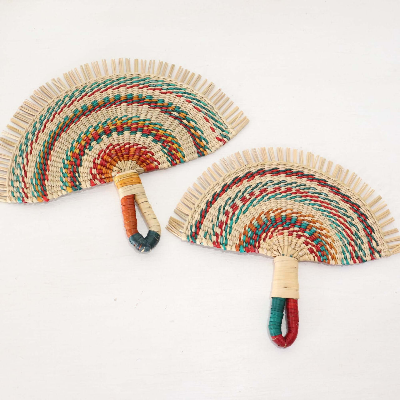 LA LA VAN – Handwoven Fan (Wall Hanging & Hand Fan) featuring colorful woven patterns and wrapped handles.