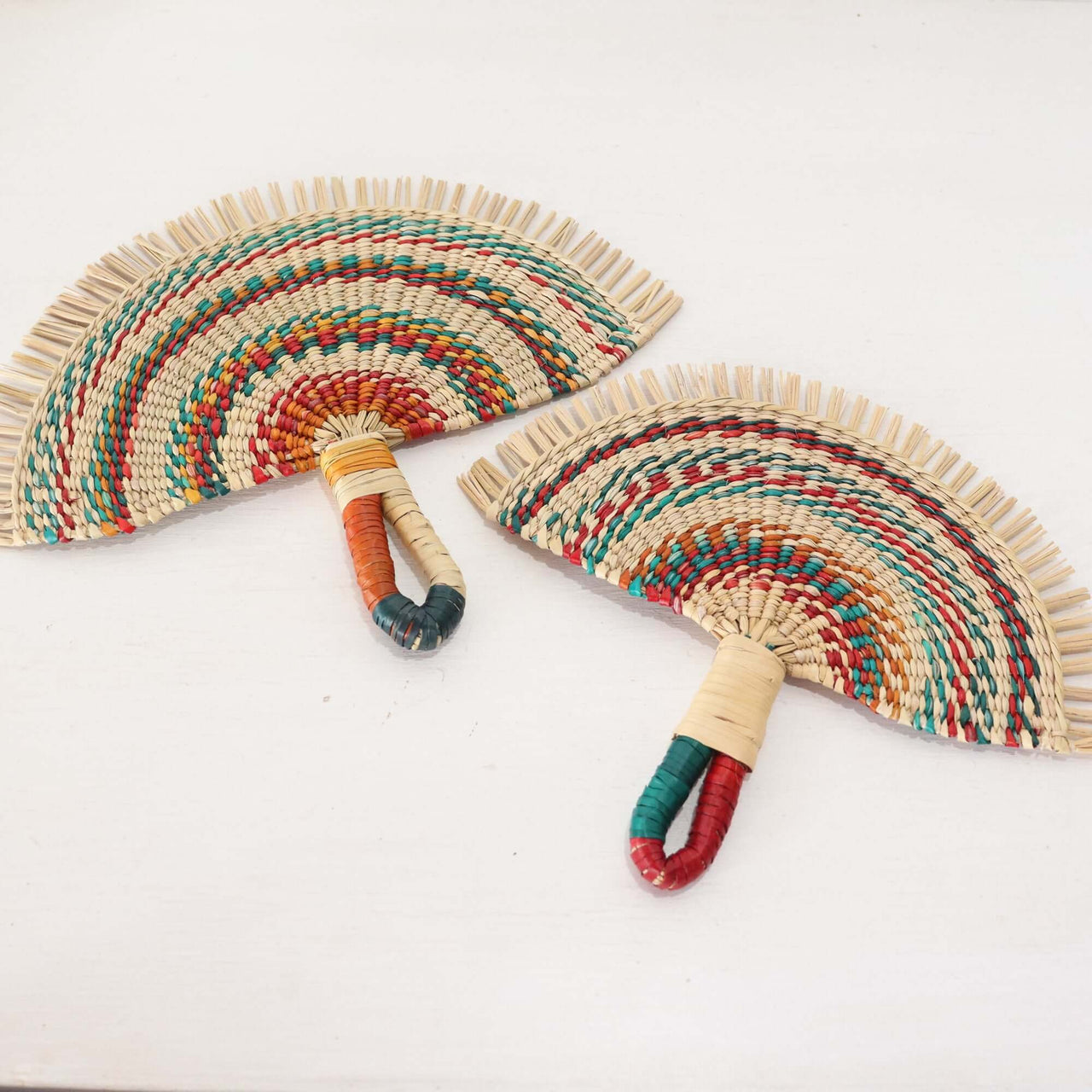 LA LA VAN – Handwoven Fan (Wall Hanging & Hand Fan) featuring vibrant multicoloured patterns and wrapped handles.