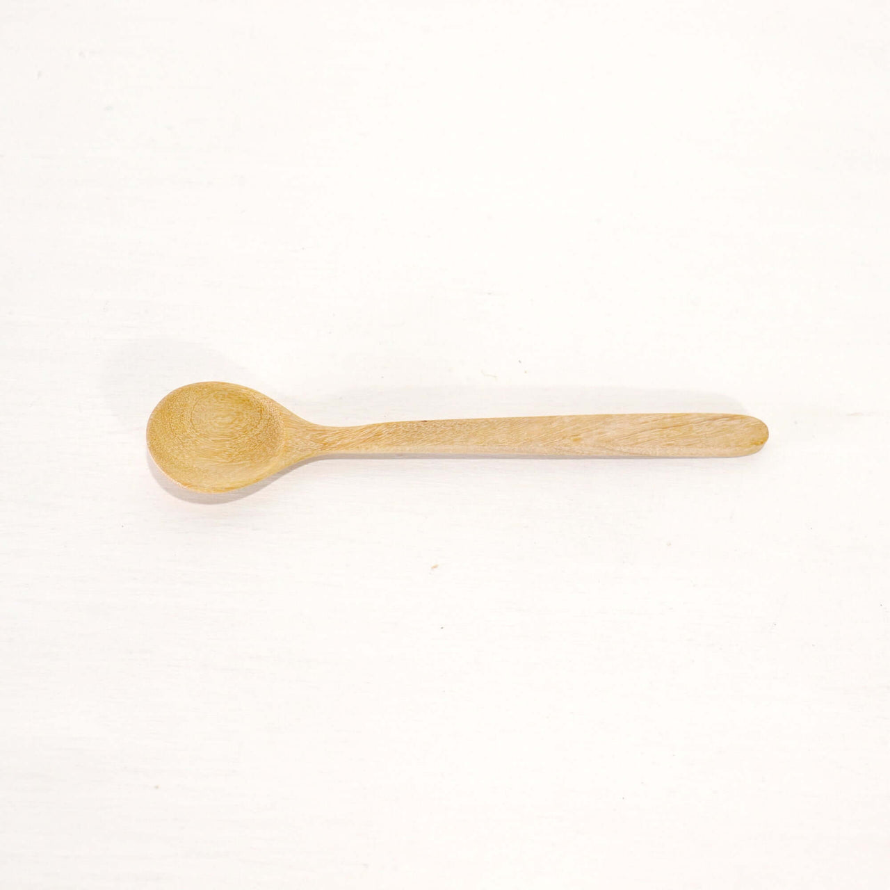 SU THI MA Wooden Honey Spoon on a white background, showcasing its handcrafted design and natural wood finish.