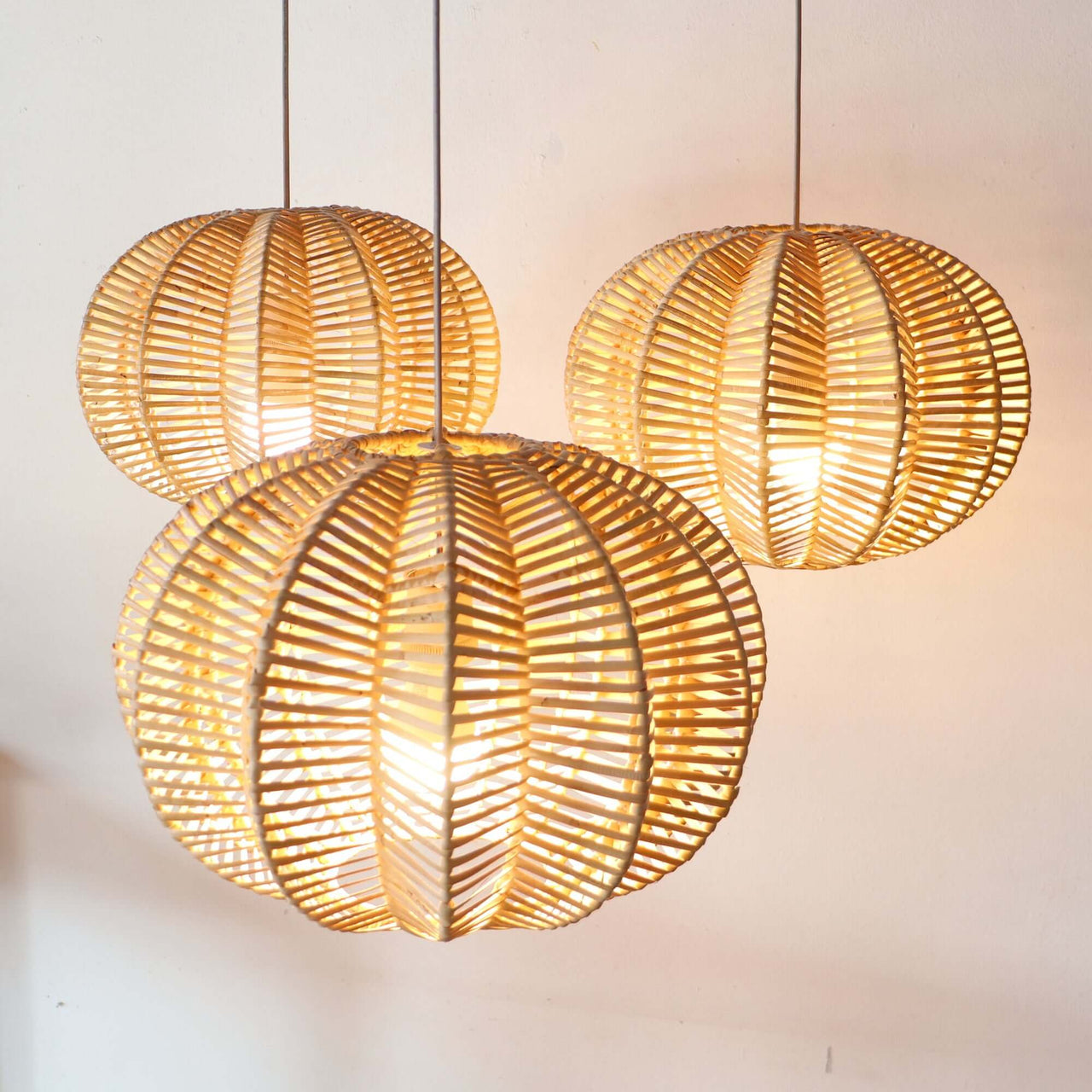 PALAVEE — rattan pendant light casting naturally diffused light