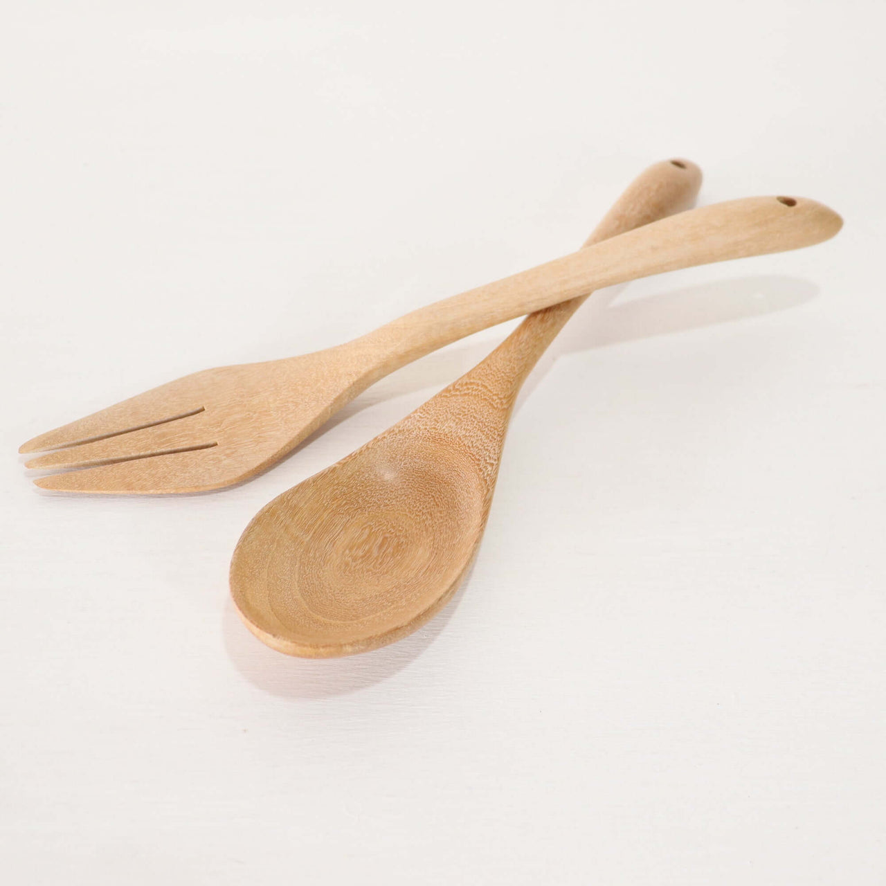 SA LIN THIP Wooden Salad Fork and Spoon Set handcrafted wooden serving utensils on a white surface