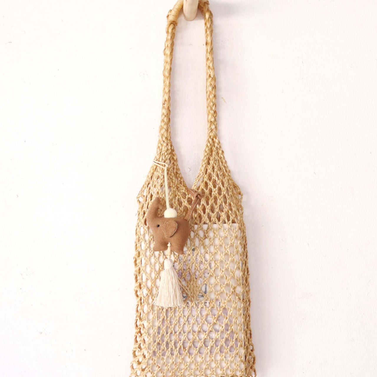 KADARA — tassel bag charm as an everyday artisan accent