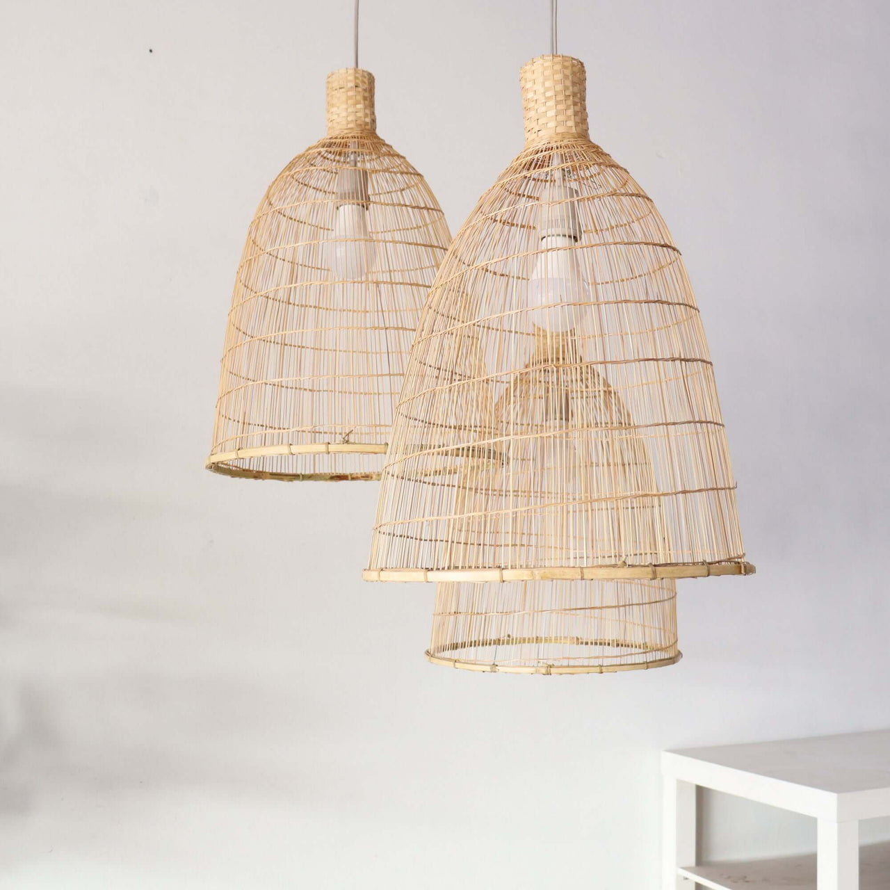 RASRI handwoven bamboo pendant light shade with natural woven texture and warm ambient glow, by Thai artisans
