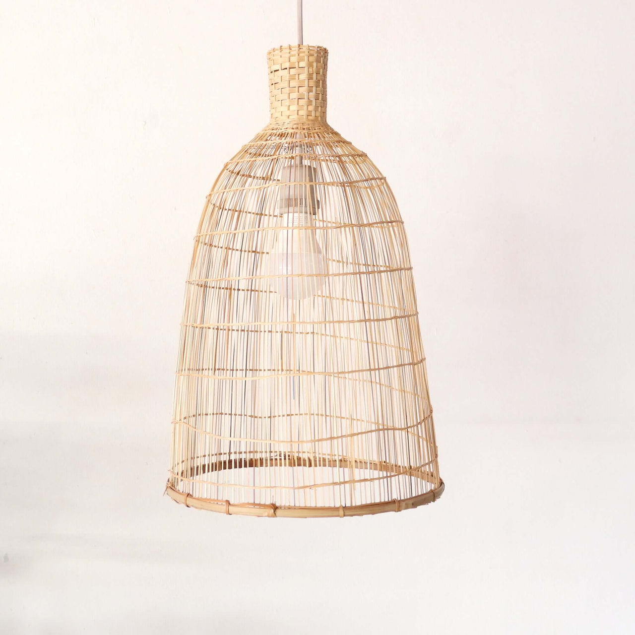 JINTRANA — handwoven bamboo pendant light with an open weave that diffuses soft golden light