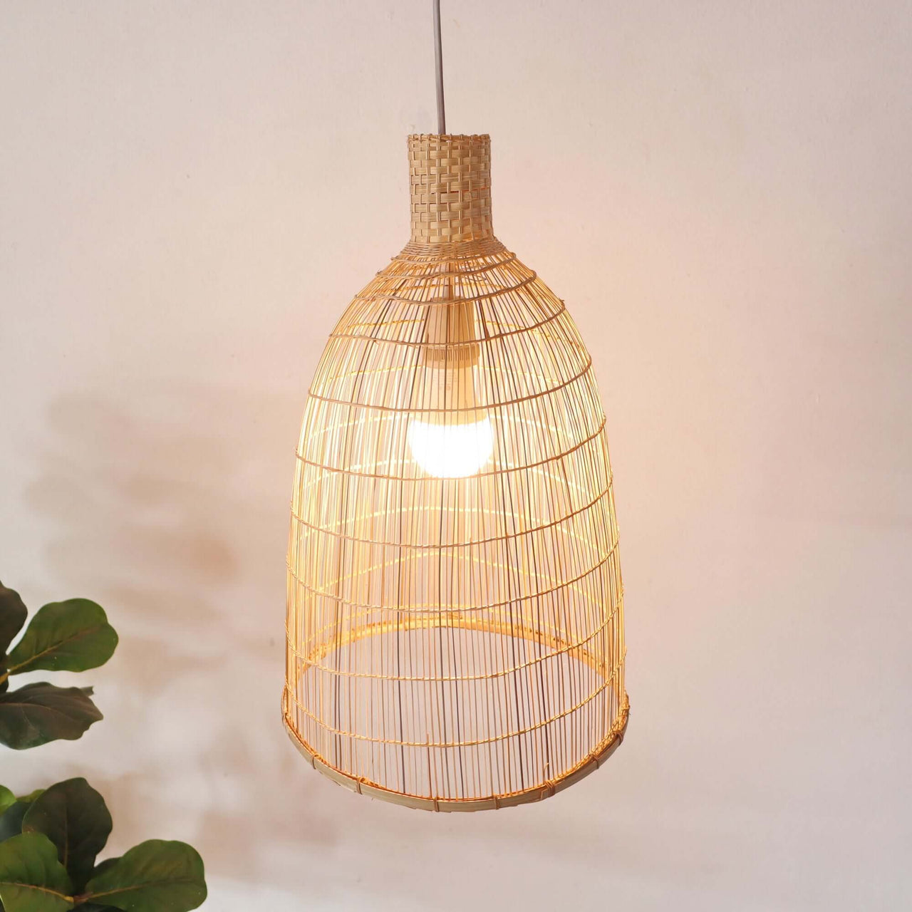 JINTRANA — bamboo pendant light above a dining table for warm ambient glow
