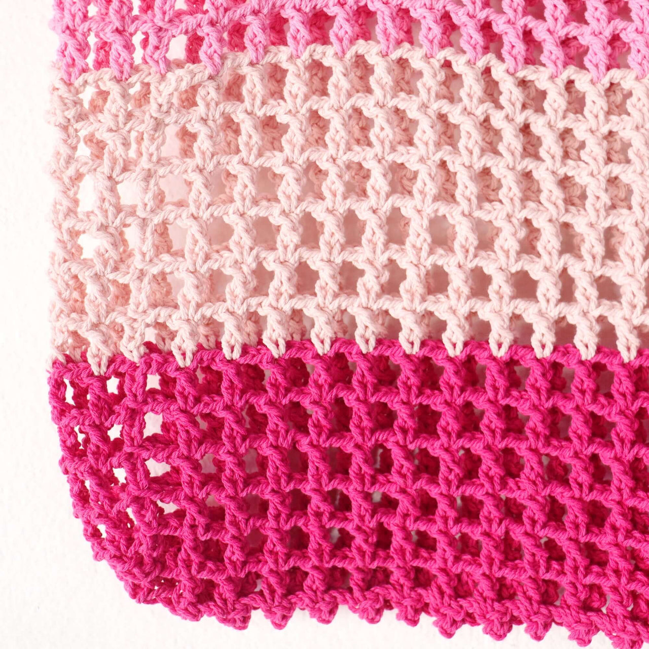 Pink Layer Crochet — straw handbag styled for summer beach outings