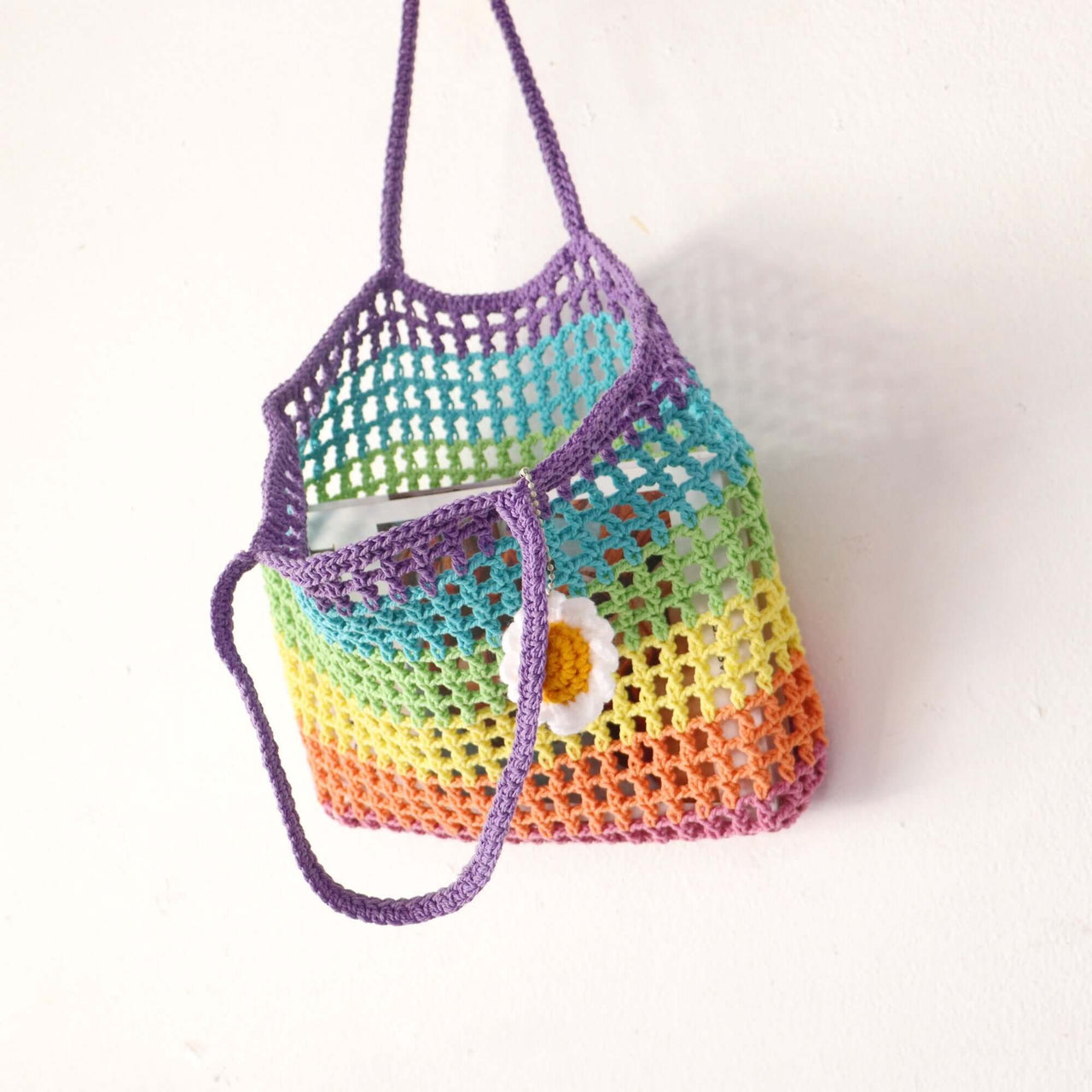 Sairung — natural straw handbag with an artisan woven finish
