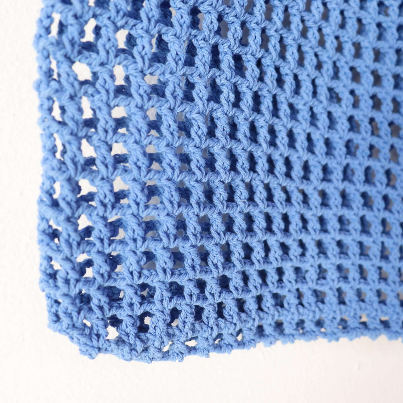 Blue Crochet Bag — straw handbag styled for summer beach outings