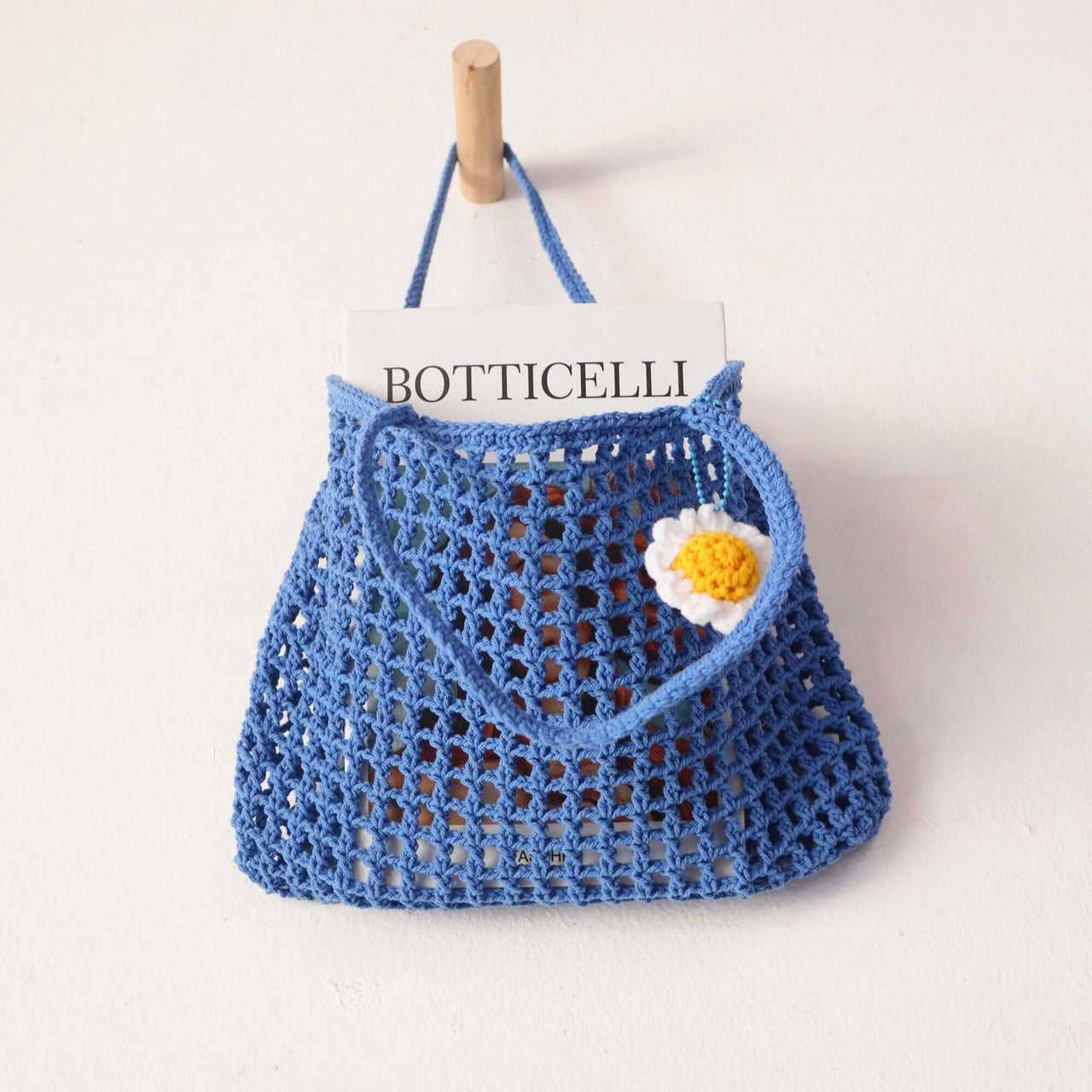 Blue Crochet Bag — straw handbag with a relaxed, vacation-ready look
