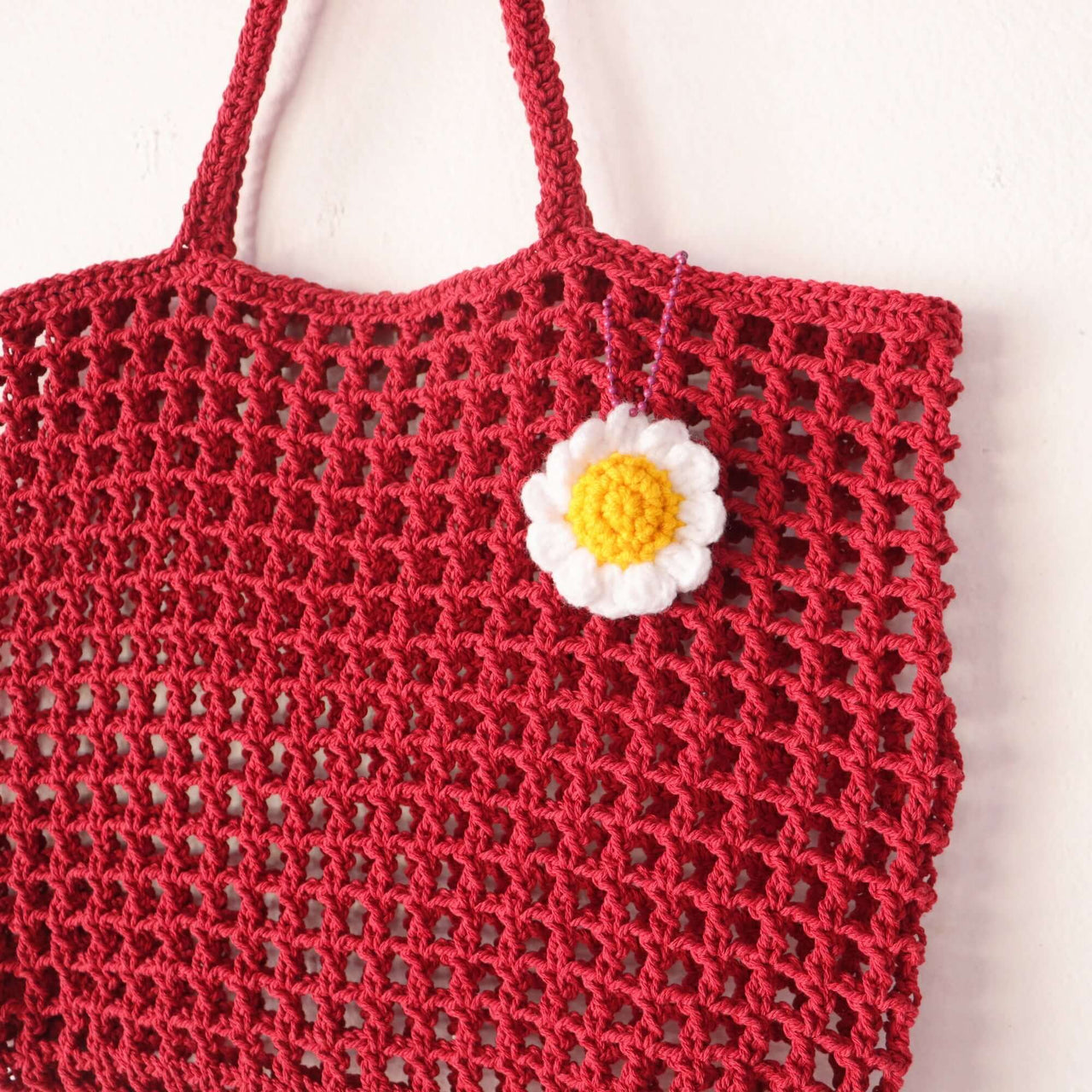 Red Crochet Bag — straw handbag styled for summer beach outings