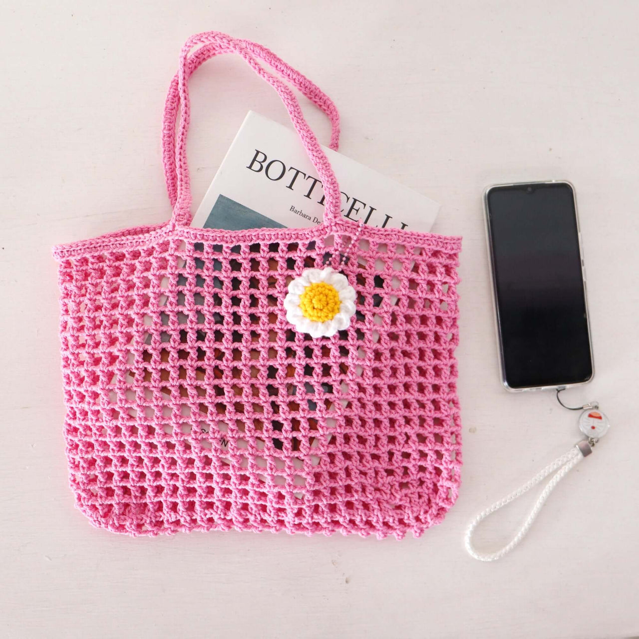 Pink Crochet — handwoven straw handbag with a soft, natural weave