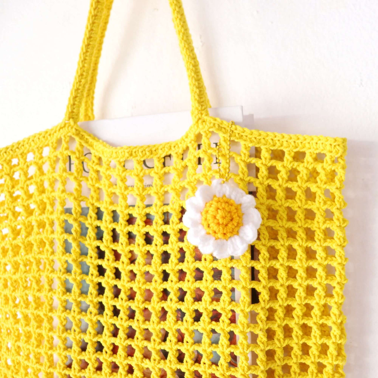 Yellow — straw handbag that pairs with boho and resort outfits