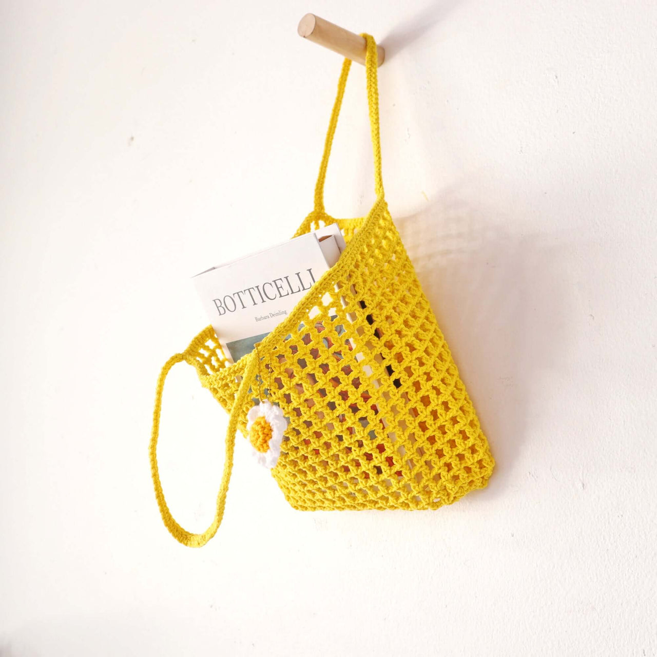 Yellow — natural straw handbag with an artisan woven finish