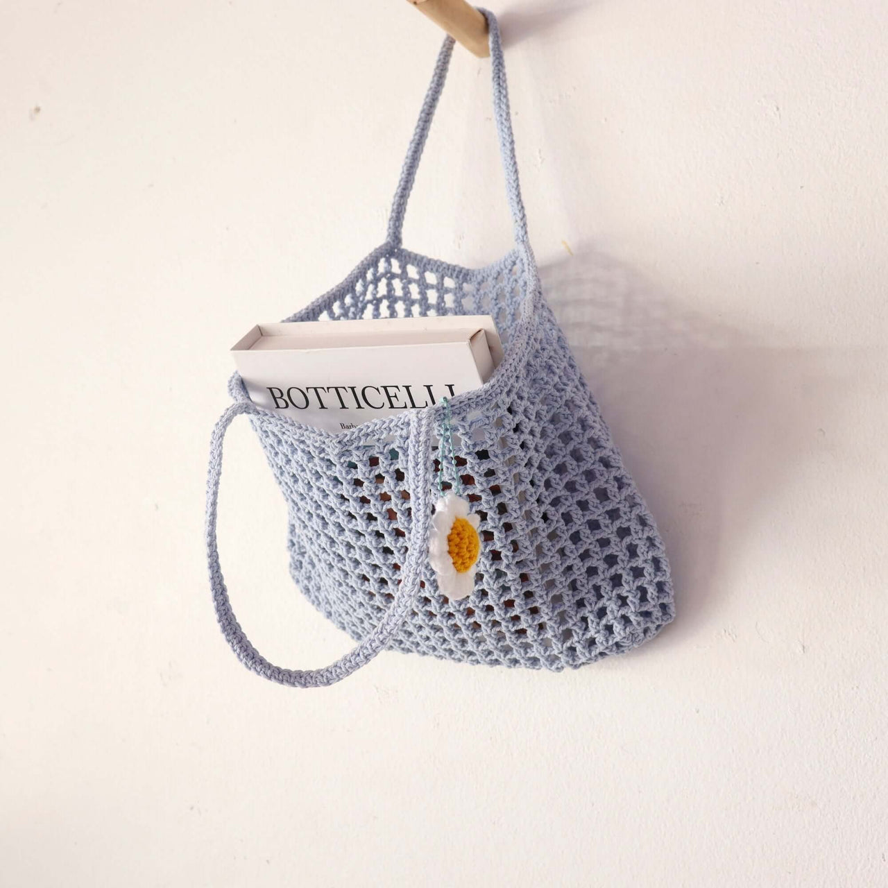 Light Blue Crochet — straw handbag styled for summer beach outings