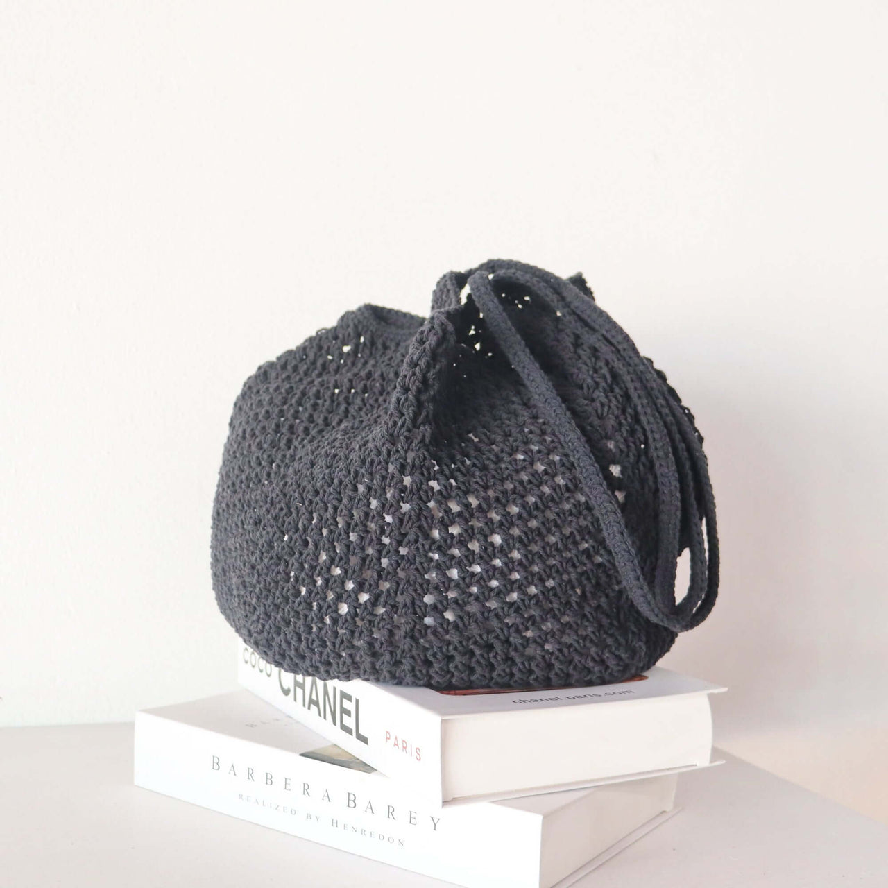 Black Crochet Shoulder — straw shoulder bag with a relaxed, vacation-ready look