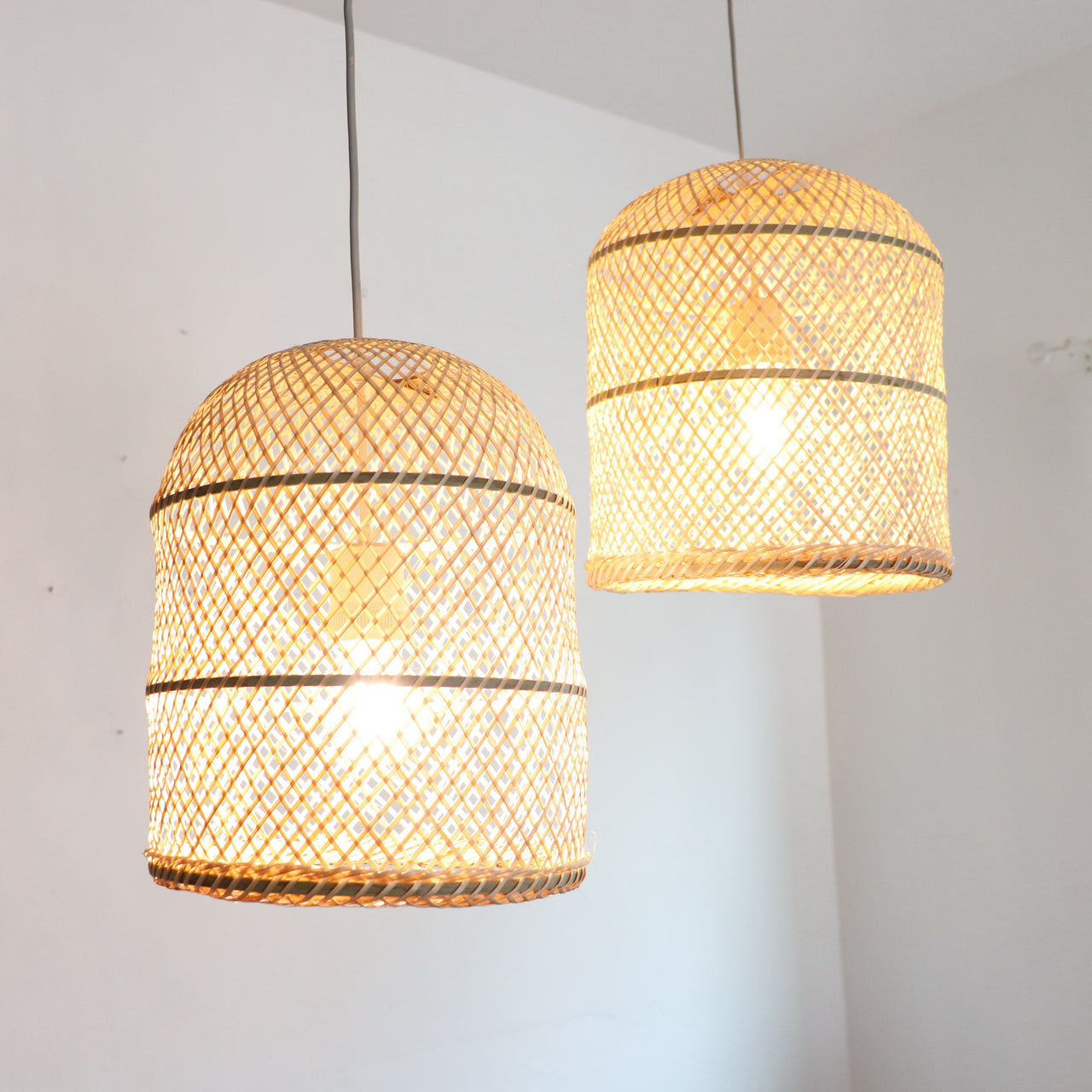 ARUN — bamboo pendant light shade above a dining table for warm ambient glow