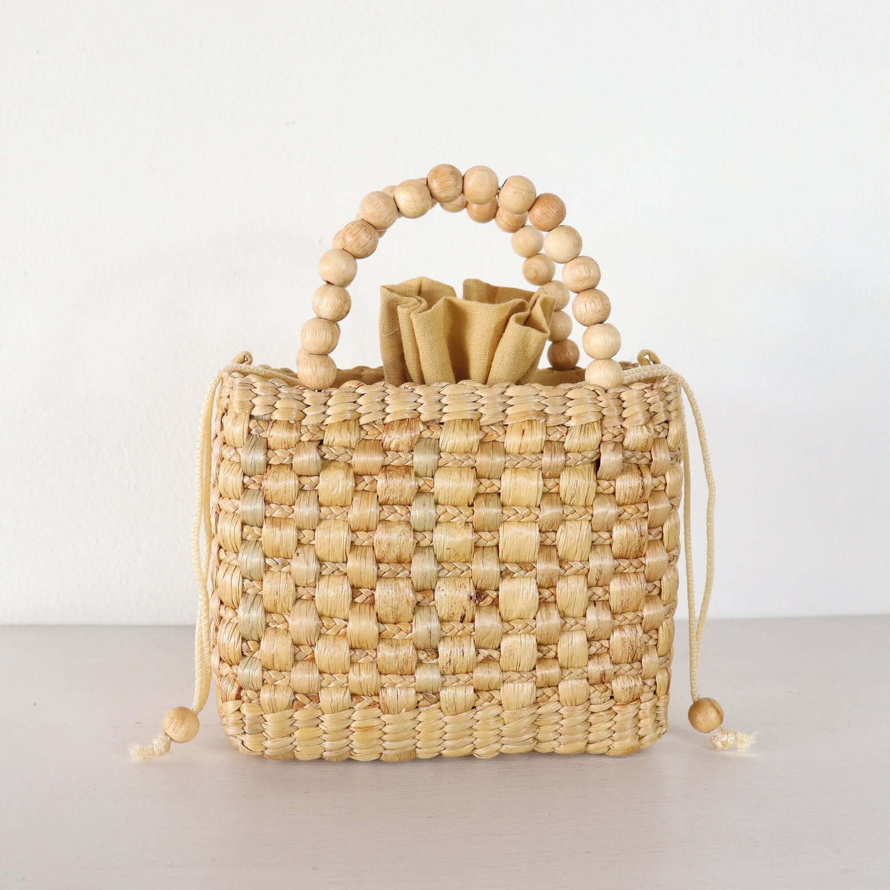 Ratsame — straw handbag with a relaxed, vacation-ready look