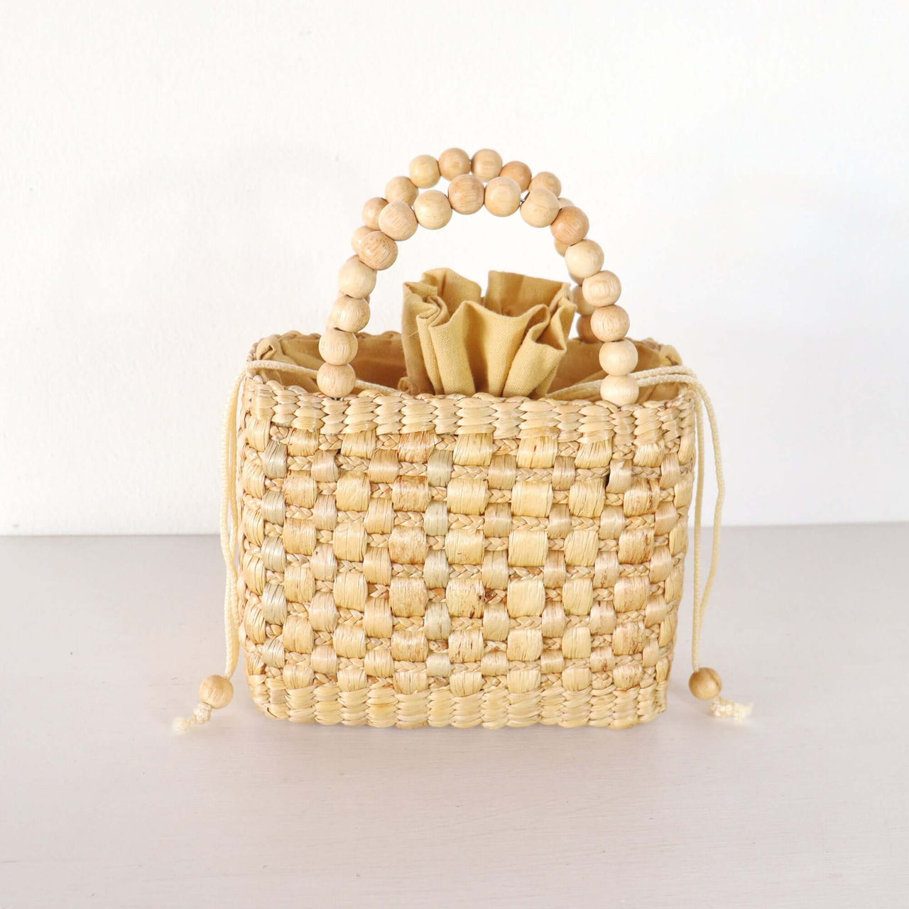 Ratsame — straw handbag styled for summer beach outings