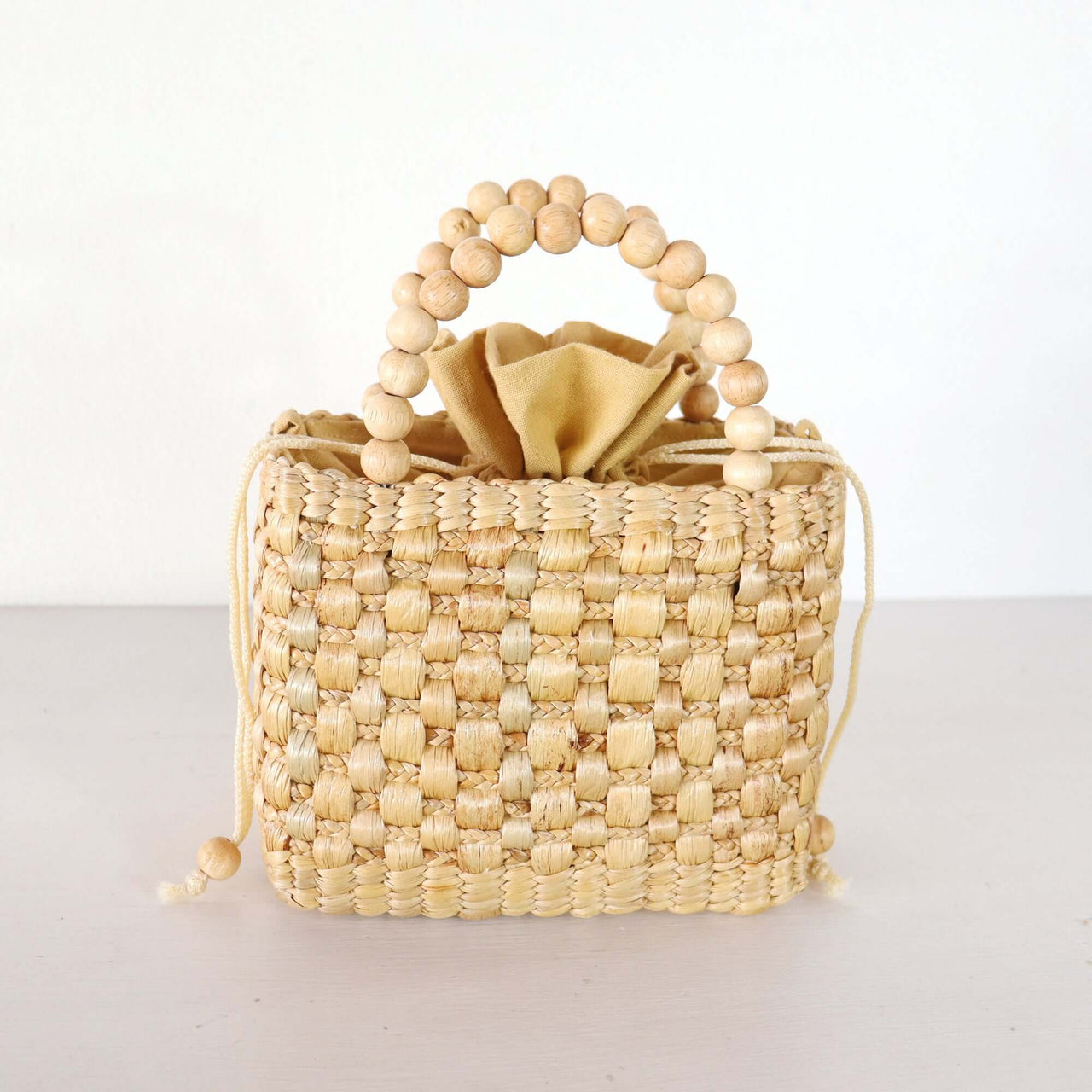 Ratsame — straw handbag that pairs with boho and resort outfits